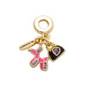 One MCB charm assembly with pink balloon dog, black heart-decorated bag, Lucky tag and large attached bracelet ring on a transparent background — CHARMS-00854