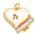 Heart-shaped piano charm with intact clear Everlasting Crystal keys and attached jump ring on a transparent background — CHARMS-00860